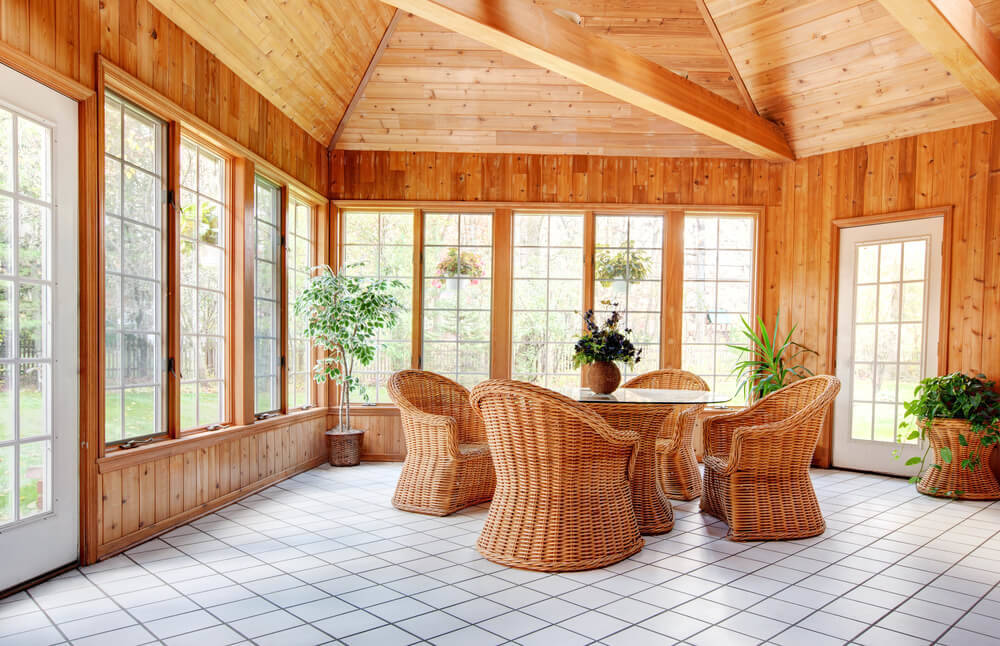 Log cabin interior with metal and glass