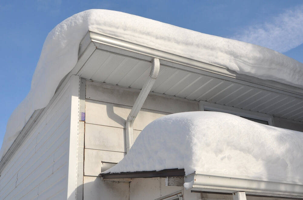 weight-of-the-snow-on-the-roof-log-cabin