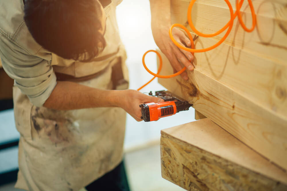 nail-gun-wooden-garage